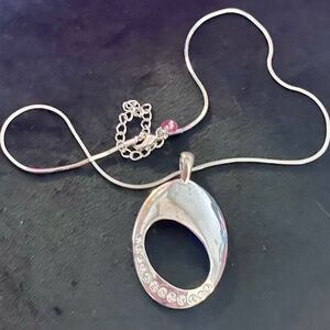 Vintage Lia Sophia - silver oval pendant with crystal accents